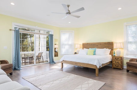 Slip into your comfortable downstairs primary bedroom with en suite bathroom and private porch