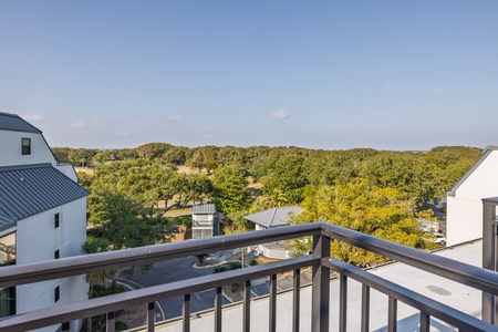 Step onto your private balcony and breathe in the peaceful tree-lined views stretching beyond.
