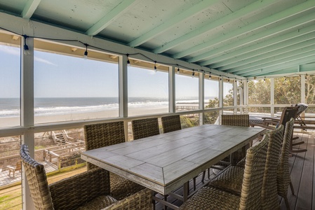 Enjoy dinner outdoors with the whole family on your screened-in porch
