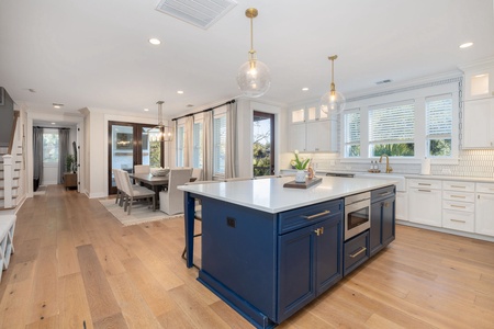 The dining table sits just off the kitchen