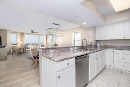 Your spacious open-concept kitchen flows seamlessly into your bright dining area