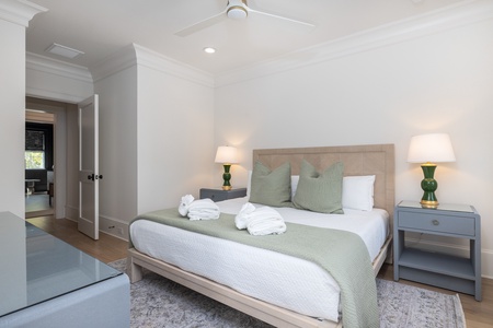 Your third king bedroom showcases premium furnishings and an en suite bathroom just steps away