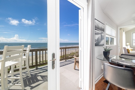 Step into your beachfront retreat where the ocean stretches endlessly before you. Open the doors to your private balcony and feel the sea breeze welcome you home to paradise.