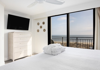 Your primary bedroom features a king size bed and en suite bathroom