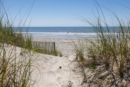 A pristine beachfront setting is just steps away from Emerald Cove