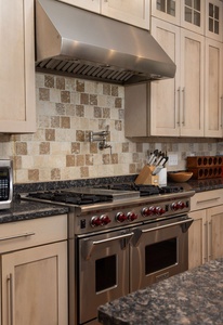 Your fully equipped kitchen features a professional gas range.