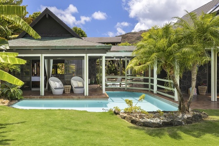 Primary Suite is a Stand Alone Suite connected to the main house via the covered Lanai.