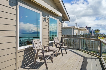 Step out to the deck and enjoy the fresh sea breeze right from the adjacent seating area.