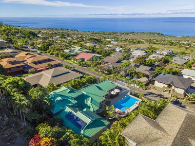 Aerial view of Honu Hale and the surrounding Kona hillside neighborhood.