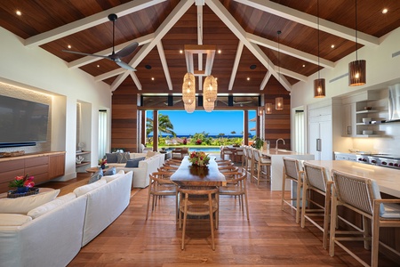 Grand entryway leading to open, elegant spaces with ocean vistas.