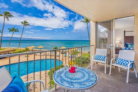 Enjoy a cool drink on the lanai while taking in stunning views of the pool and ocean. Perfect for relaxing in paradise.