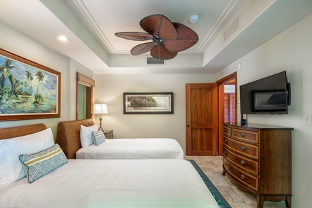 The bedroom has TV, ceiling fan, central AC and easy access to the second bathroom.