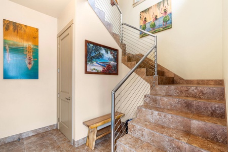 Local artwork lines the stairwell connecting all three levels, but an elevator stands by for beach-tired legs and effortless luggage transfers.