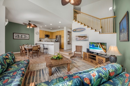 Spacious open-concept living area with island-inspired decor, perfect for relaxation and gatherings.
