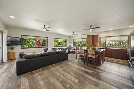 Expansive common space with dual ceiling fans and ample natural light—ideal for family-style entertaining.