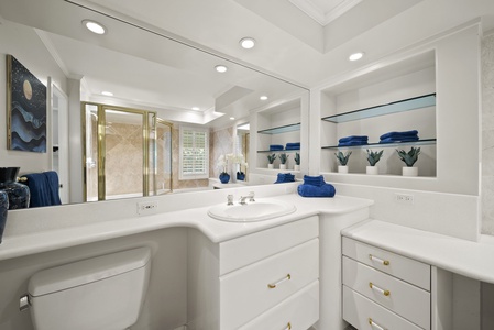 Indulge in a spa-like experience with modern fixtures and a deep soaking tub.