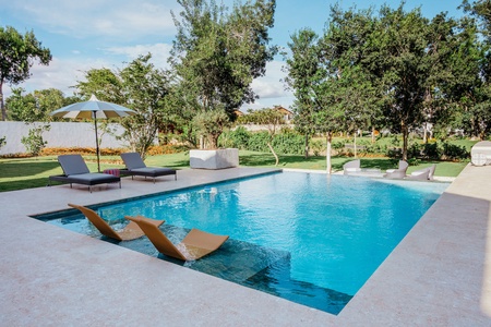 Lounge by the pool and experience the serene beauty of Dominican Republic.