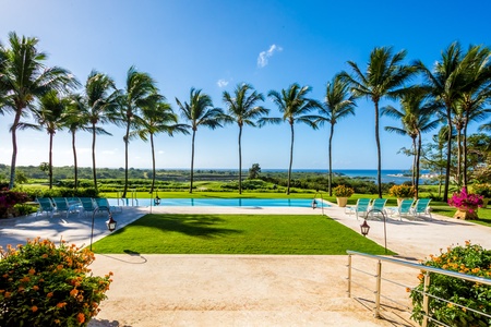 Take a refreshing dip in the pool with tropical views.