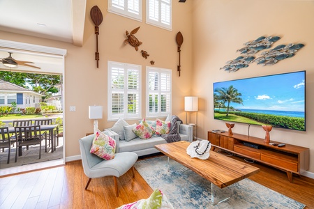 This home features high ceilings and bright colorful design.