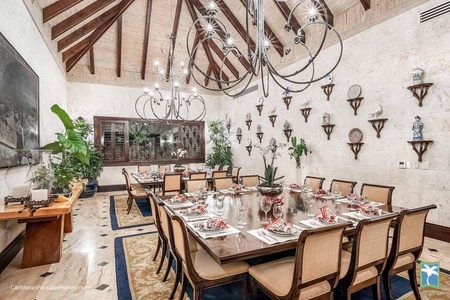 Formal dining area, beautifully decorated for hosting large dinners.