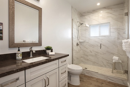 Guest bathroom 2 designed with clean, modern fixtures and plenty of counter space.