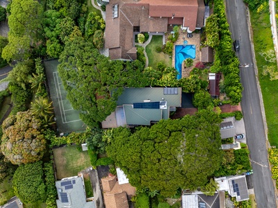 Wake up to panoramic views of Honolulu’s lush hillsides in your secluded rainforest retreat.