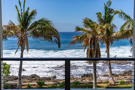Lanai seating faces out to sea, offering a serene spot for meditation, sunrise, or stargazing.