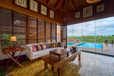 Unwind in the elegant lounge area, perfectly blending indoor comfort with outdoor beauty.