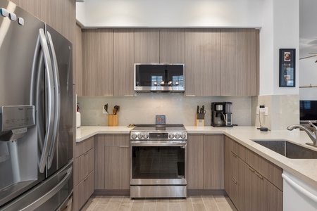 A fully-stocked kitchen with spacious countertops to make meals a breeze.