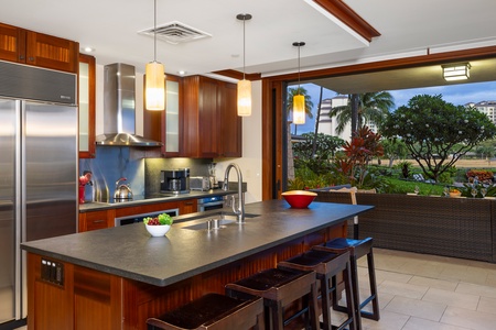 The Roy Yamaguci designed kitchen with views out of the sliding doors to the lanai.