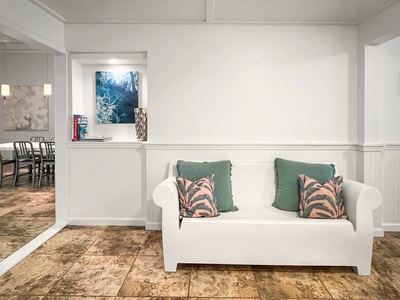 Another view of the seating area, offering a casual lounging space.