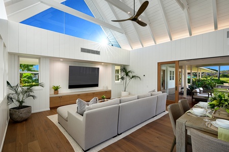 Lounge in the airy living area with high vaulted ceilings.