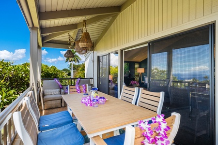The lanai at Wailea Ekolu 1106 flows effortlessly into the living area for easy indoor-outdoor living.