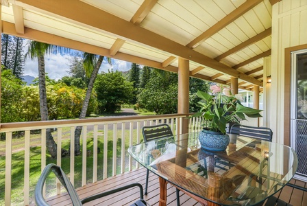 Situated on a quiet cul-de-sac, surrounded by a large lawn and tropical vegetation.