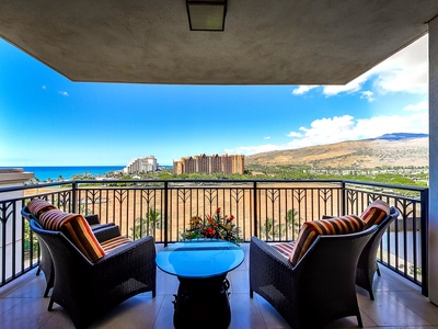 Dine al fresco on the lanai with panoramic views of the island and sea.