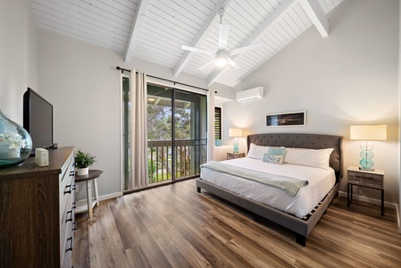 Primary bedroom equipped with A/C, ceiling fan and views