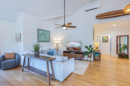 Airy living room with vaulted ceilings.