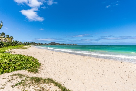 Step directly onto the sandy beach from your private yard.