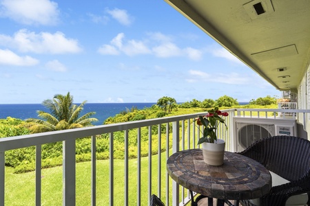 Morning coffee on the lanai, the Pacific filling the view past the rail.