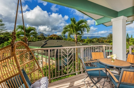 A relaxed morning in front of the scenic mountain view from the lanai, a perfect spot for a morning coffee.