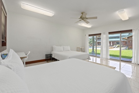 Comfortable guest bedroom with direct outdoor access.