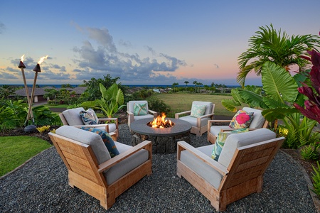 Cozy up by the fire pit as the sun sets over the horizon.