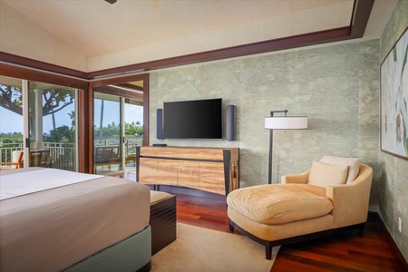Modern furnishings and artistic textures make this bedroom a restful retreat with top-tier comfort.