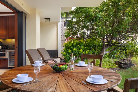 Enjoy your morning coffee on this cozy lanai.