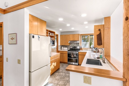 Coupled with top-tier appliances, this kitchen offers everything needed for your culinary adventures.