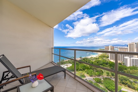 What a stunning view of the ocean, sky and trees in one look.