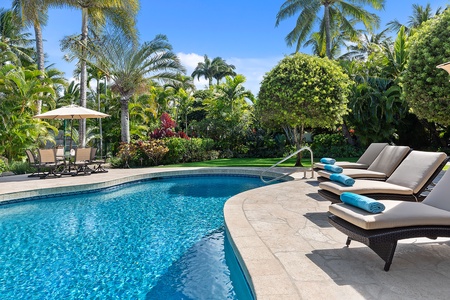Private Pool at Kailua Shores Estate surrounded by lush greenery, offering a tranquil retreat at Kailua Shores Estate.