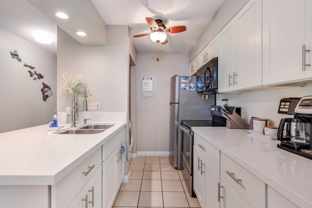 The kitchen has ample space to prepare meals conveniently.