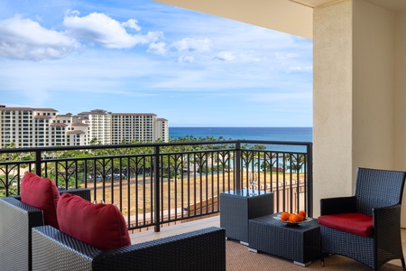 One of two lanai areas with seating and island views.