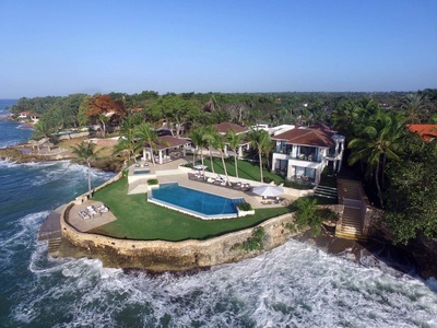 Marvel at the stunning aerial view of Casa Al Mare, where the luxurious estate meets the vibrant sea.